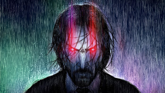 John Wick with glowing red eyes in the rain
