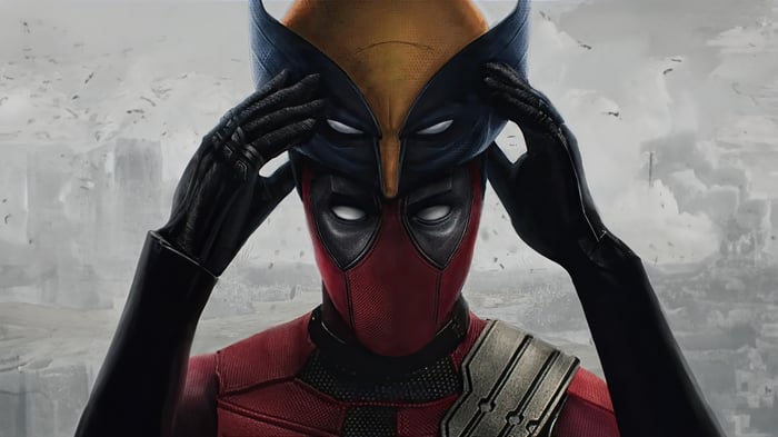 Deadpool removing Wolverine mask