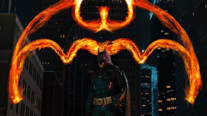 Batman with Fiery Bat Symbol in City