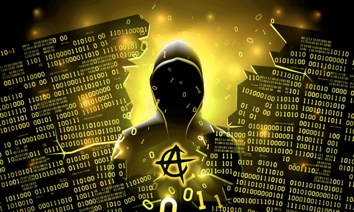 Anonymous hacker with anarchy symbol and binary code
