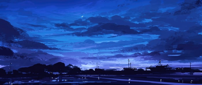 Evening clouds and a crescent moon over a harbor
