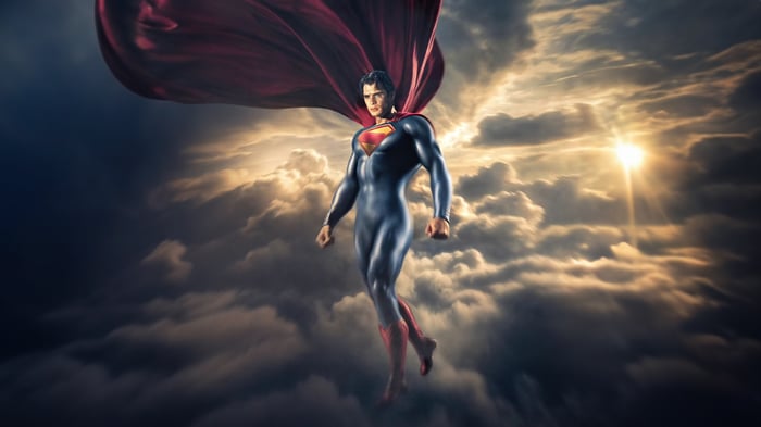 Superman flying through clouds with sun rays