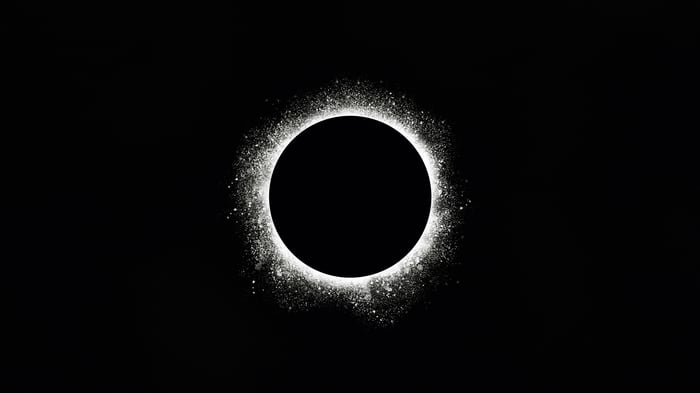 Abstract Eclipse with White Dust Particles