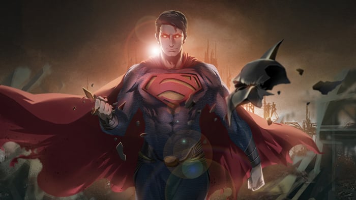 Superman holding a broken Batman cowl