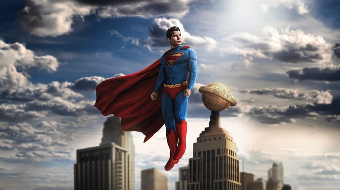 Superman flying over Metropolis with Daily Planet globe