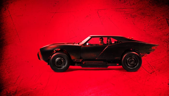 The Batman Mobile on a red background