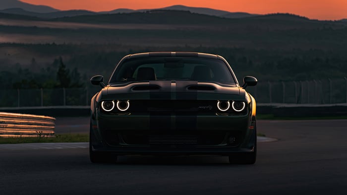 Dodge Challenger Outcast on a race track at sunset