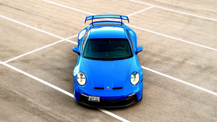 Blue 2024 Porsche 911 GT3 on asphalt
