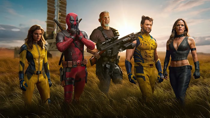 Deadpool, Wolverine, Cable, Domino, and Psylocke in a field