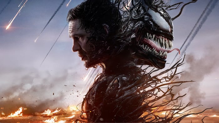 Venom and Eddie Brock in battle