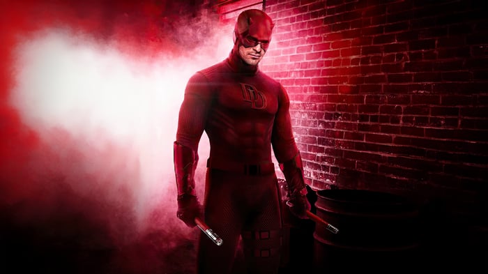 Daredevil standing in red smoke