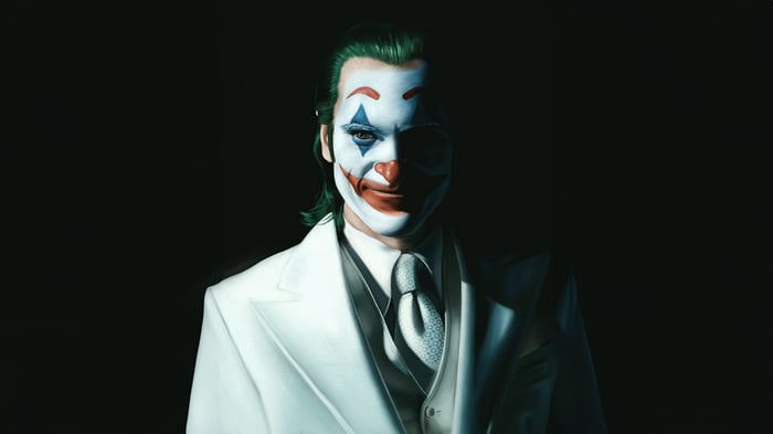 Joker in a white suit with clown makeup