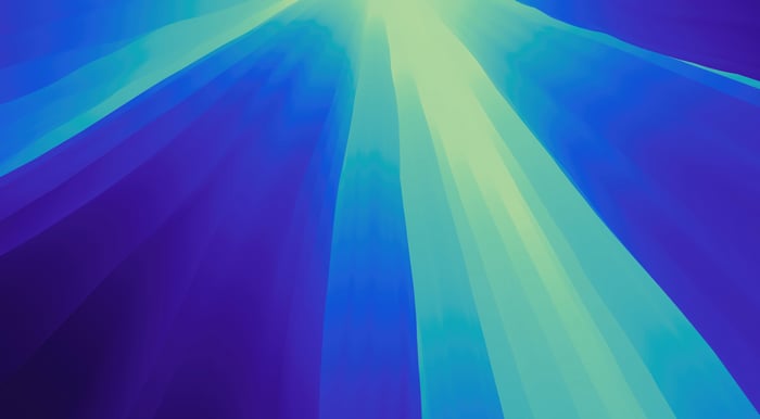 Abstract blue and green light rays