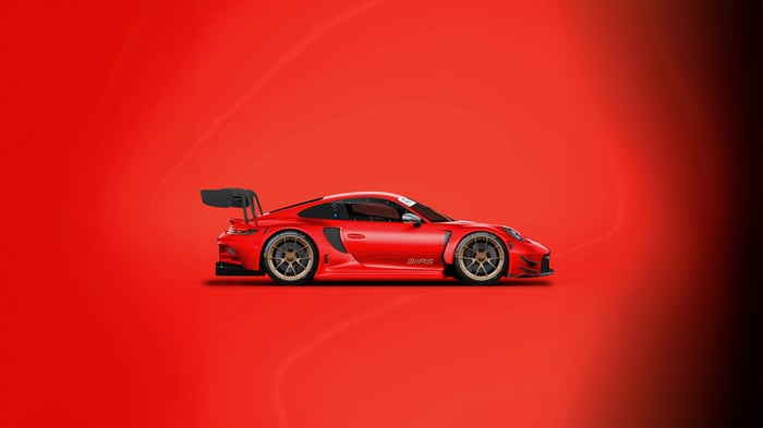 Red Porsche 911 GT3 RS with a large rear spoiler