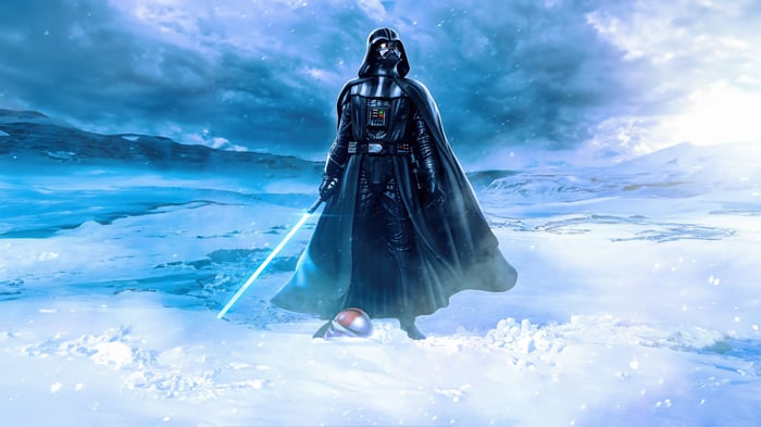 Darth Vader with Lightsaber in Snowy Landscape