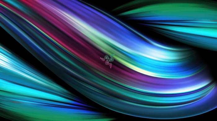 Razer logo on abstract colorful light streaks