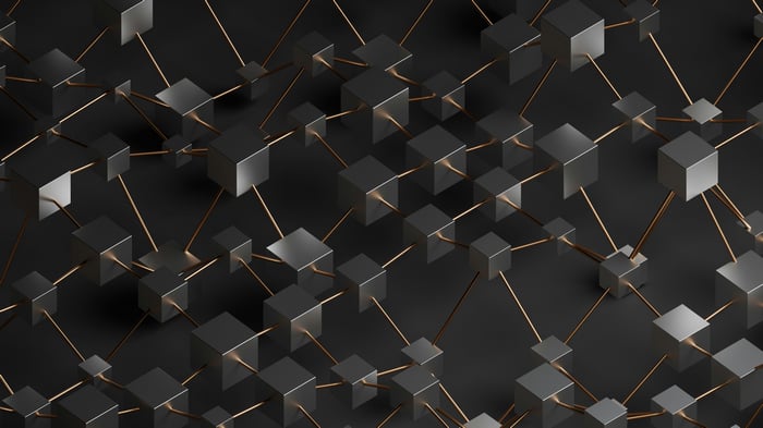 Metallic Cubes Connected by Golden Rods
