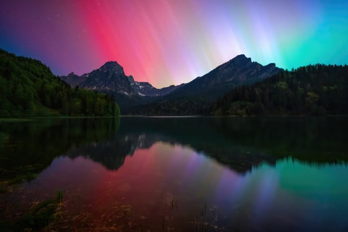 Swiss Northern Lights Over Mountains and Lake