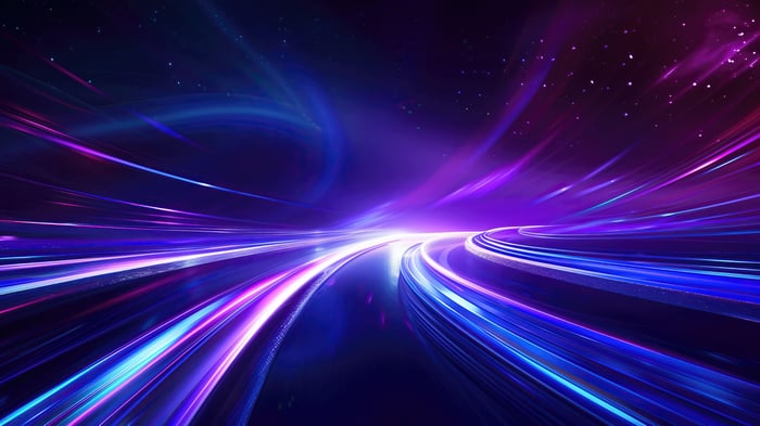Abstract light trails in space with purple and blue hues