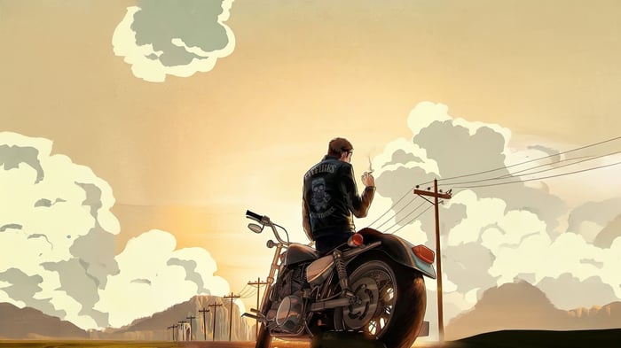 Man in leather jacket sitting on a motorcycle