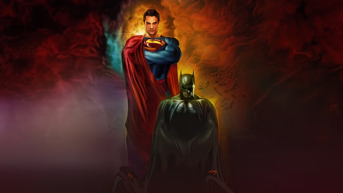 Superman and Batman in a dark, smoky background