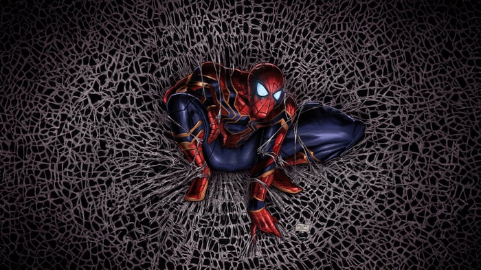 Spider-Man in Iron Spider Suit Breaking Through Web
