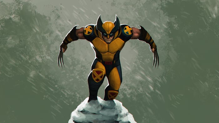Wolverine standing on a snowy peak