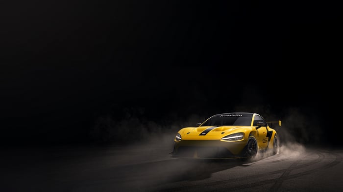 Yellow Xiaomi SU7 Ultra car drifting on track