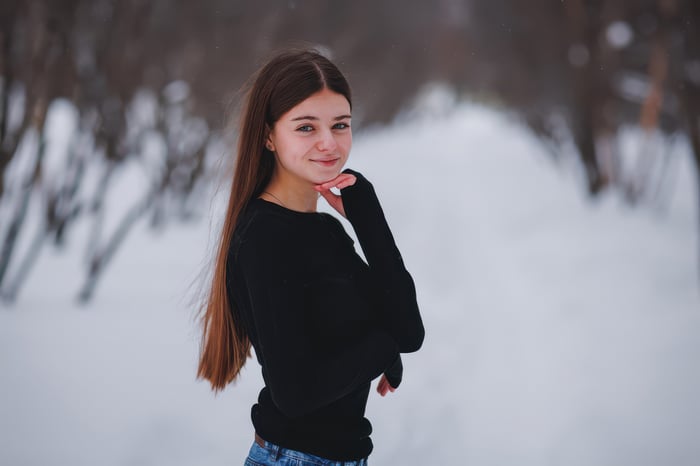 Cute Girl Smiling in Snow