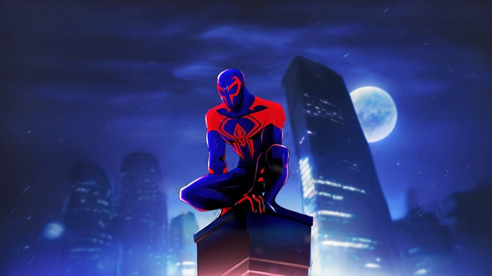 Spider-Man 2099 crouches on a building at night