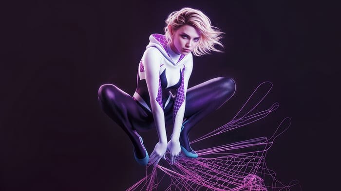 Spider-Gwen in a crouched pose with purple webbing