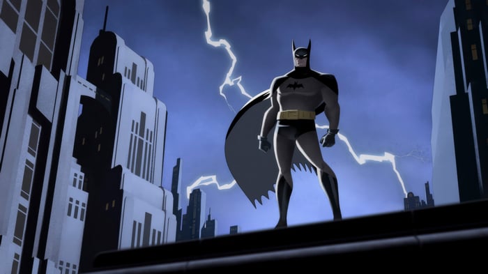 Batman Standing on a Rooftop During a Lightning Storm