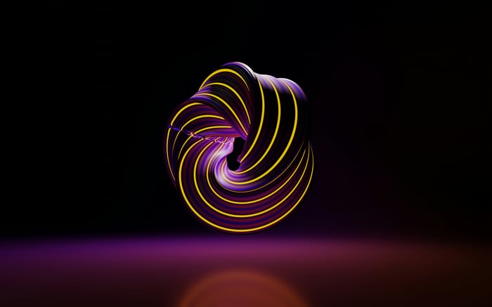 Purple and yellow abstract swirl on black background
