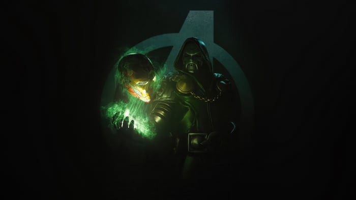 Doctor Doom holding Iron Man's mask with green energy