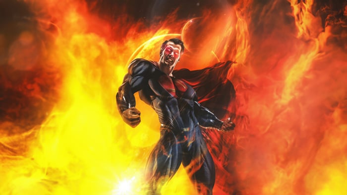 Superman surrounded by fire and cosmic elements
