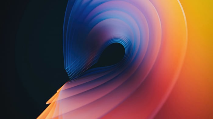 Abstract swirling gradient of blue, pink, and orange