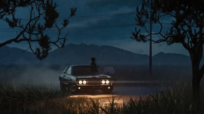 Midnight Cruise: A car parked on a rainy night