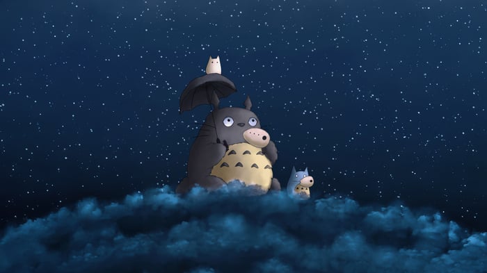Totoro and friends on clouds under starry sky