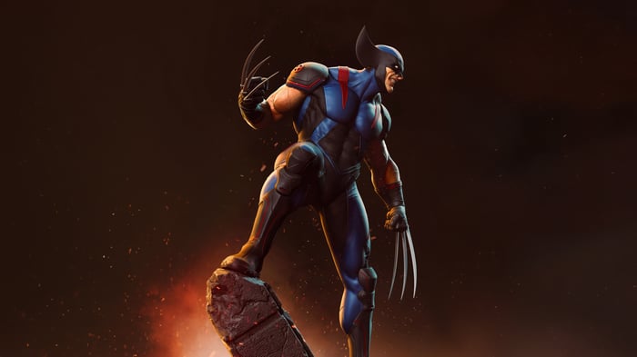 Wolverine stands on a rock with claws extended