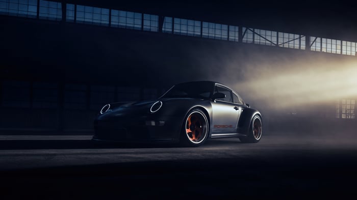 Porsche 911 in a dimly lit warehouse