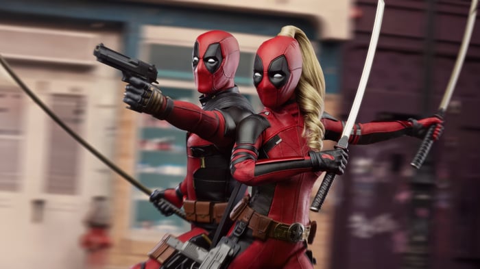 Deadpool and Lady Deadpool with Swords and Guns
