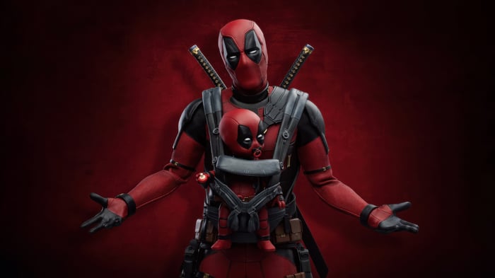Deadpool holding a baby Deadpool