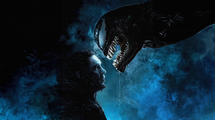 Venom and Eddie Brock face off in darkness