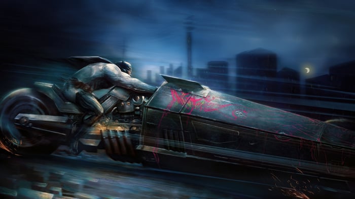 Batman on a Batpod in a dark city