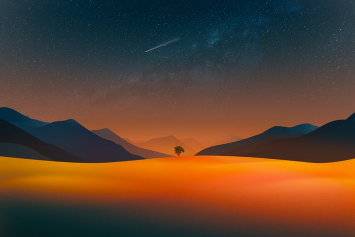 Minimalist landscape with a lone tree under a starry sky