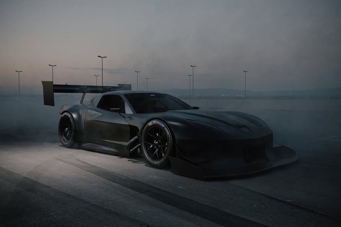 Black C6 Corvette race car with large rear wing