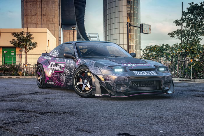 Nissan 240sx with Red Bull livery parked on asphalt