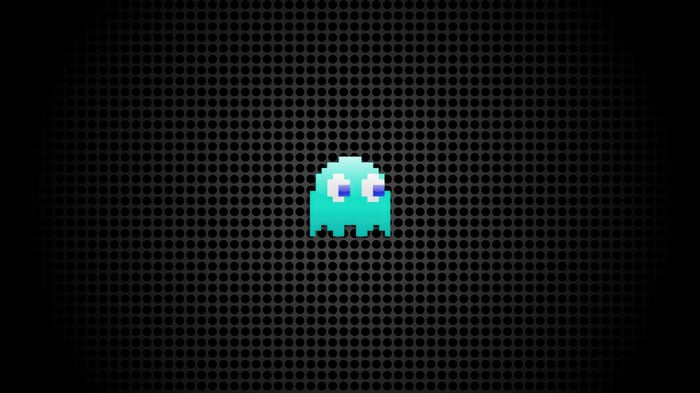 Pac-Man ghost on a black perforated background