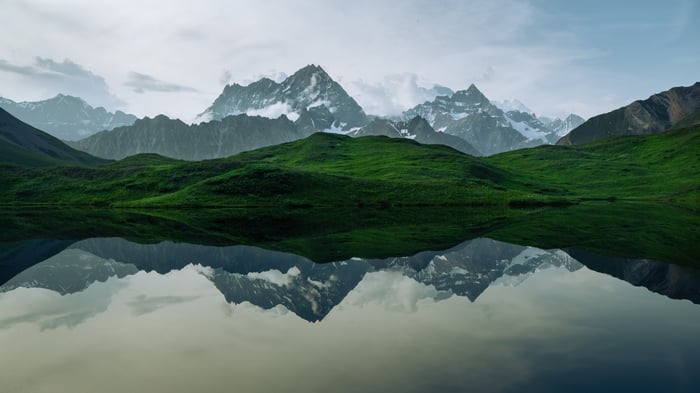 Mountains reflected in a calm lake in Switzerland