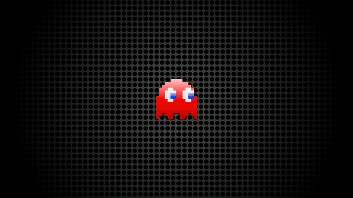 Pac-Man Red Ghost on Black Perforated Background